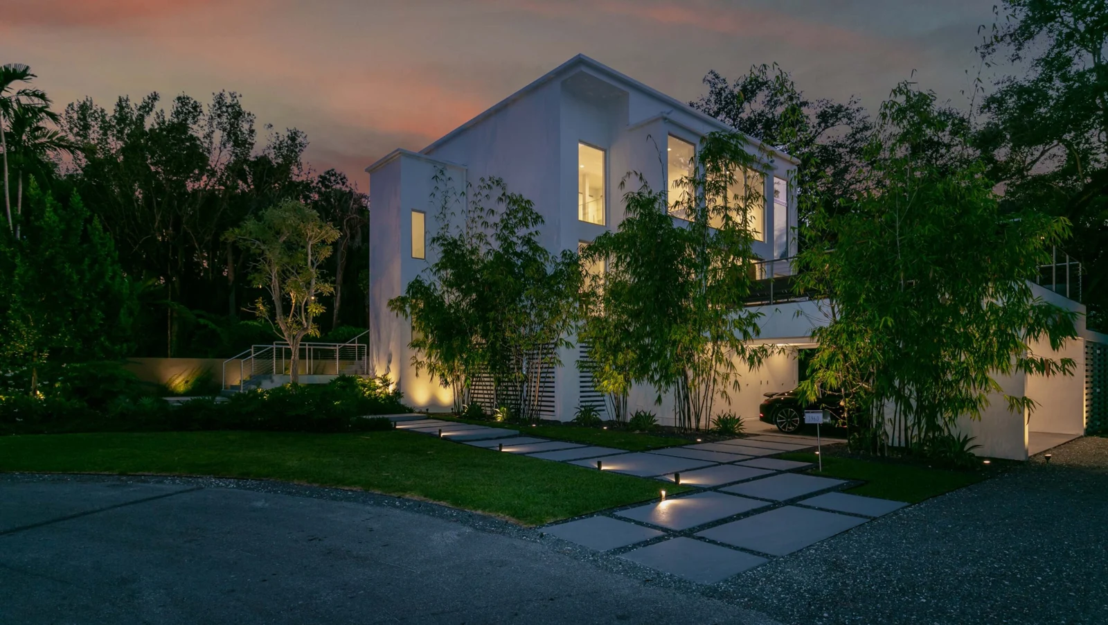 Architectural and landscape lighting at a contemporary Coconut Grove home